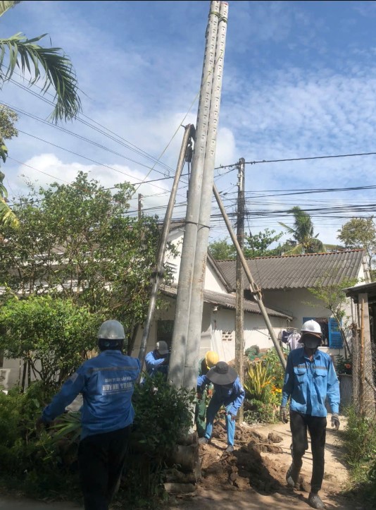 A group of people in hard hats and helmets working outside